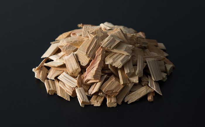 原材料となる木材チップのイメージ。